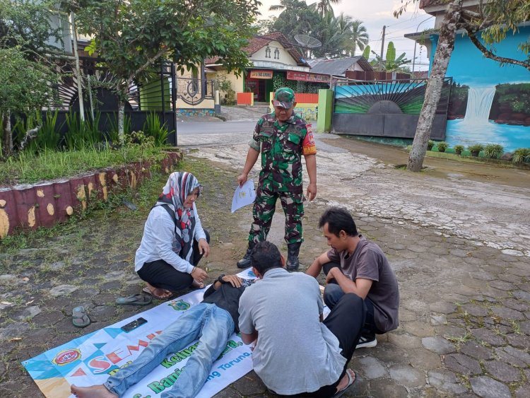 Babinsa Berperan Aktif Dalam Penyiapan Satlinmas Mengikuti Jambore.