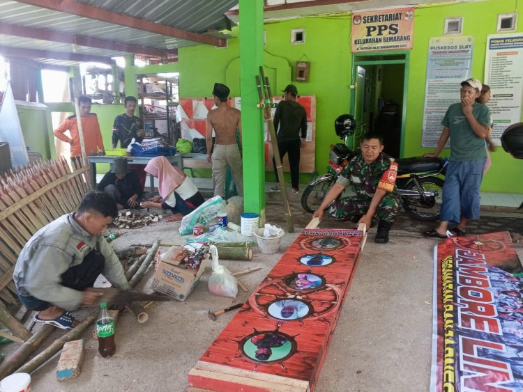 Jelang Pembukaan Jambore Linmas Tingkat Kabupaten, Babinsa Dampingi Dalam Penyiapan Akhir